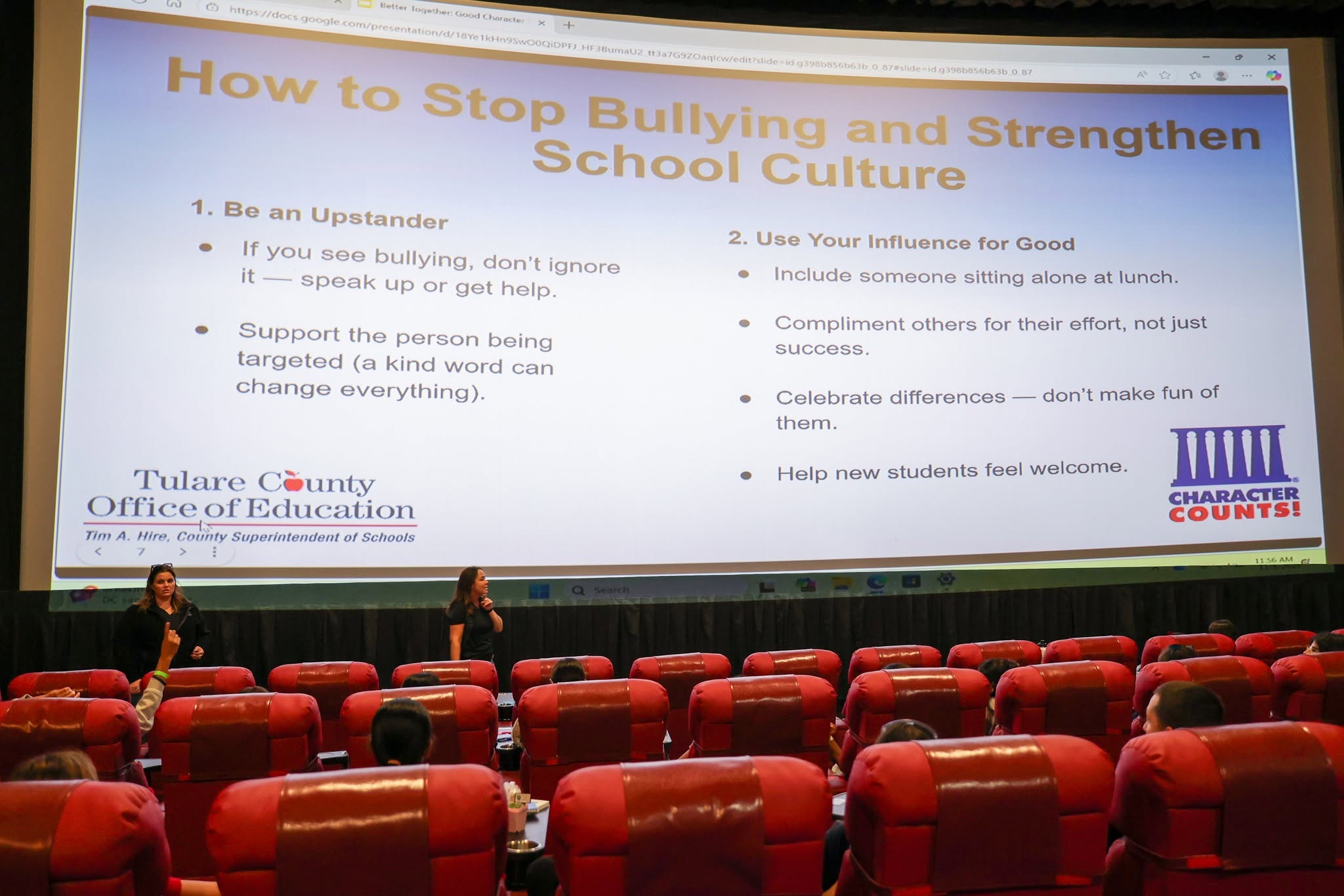 3 Presenters in a breakout session talking to students.