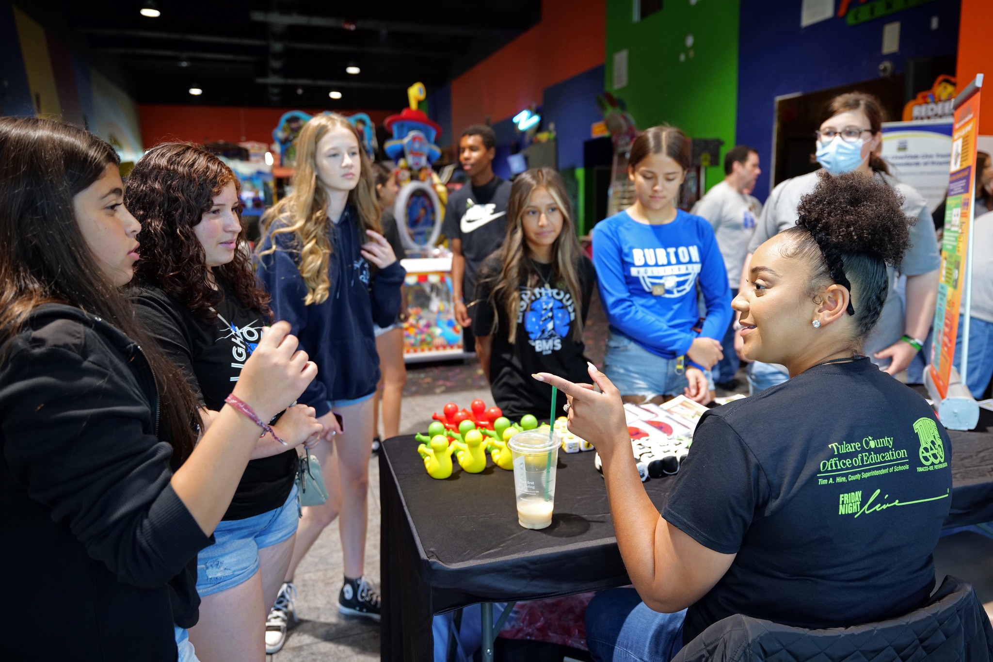 youth at a prevention booth at Adventure Park