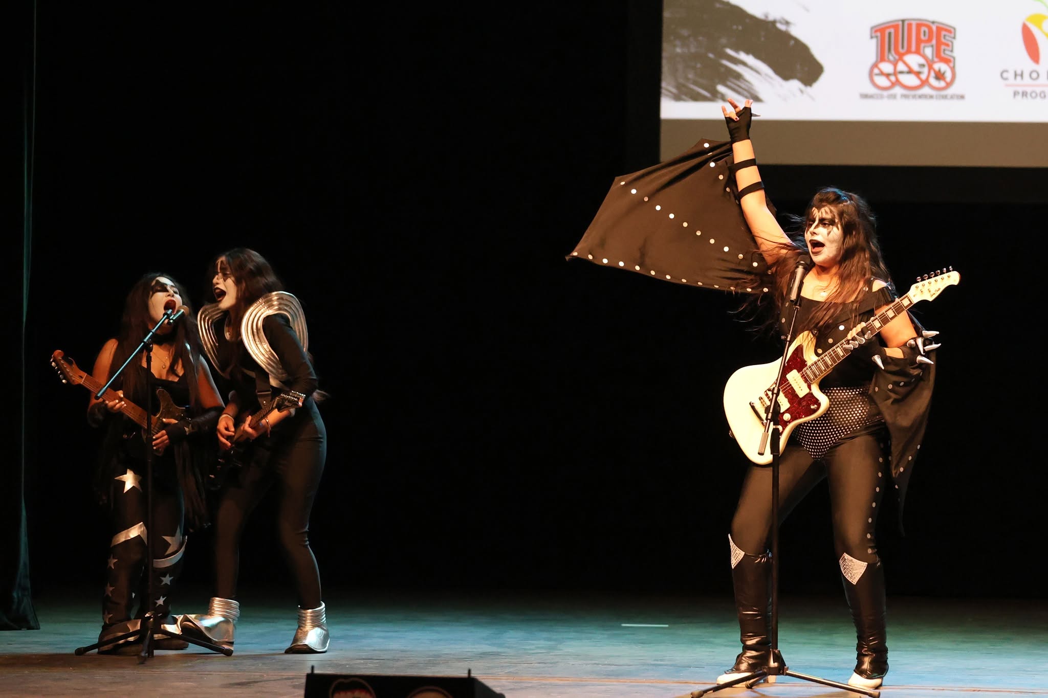 LS8 Students dressed up as a rock and roll band performing at the lip sync event.