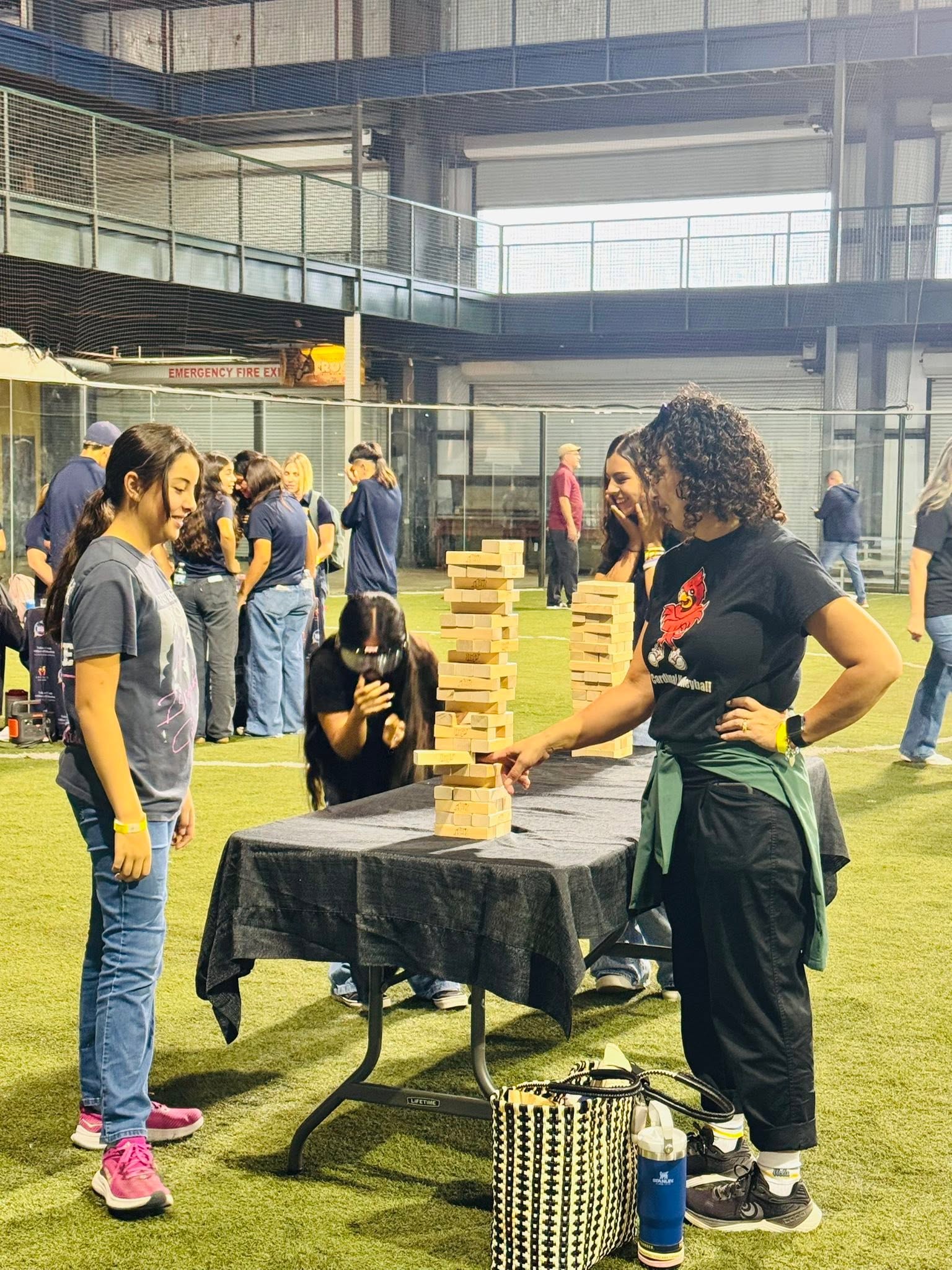 Students playing jenga with and without cannabis goggles.