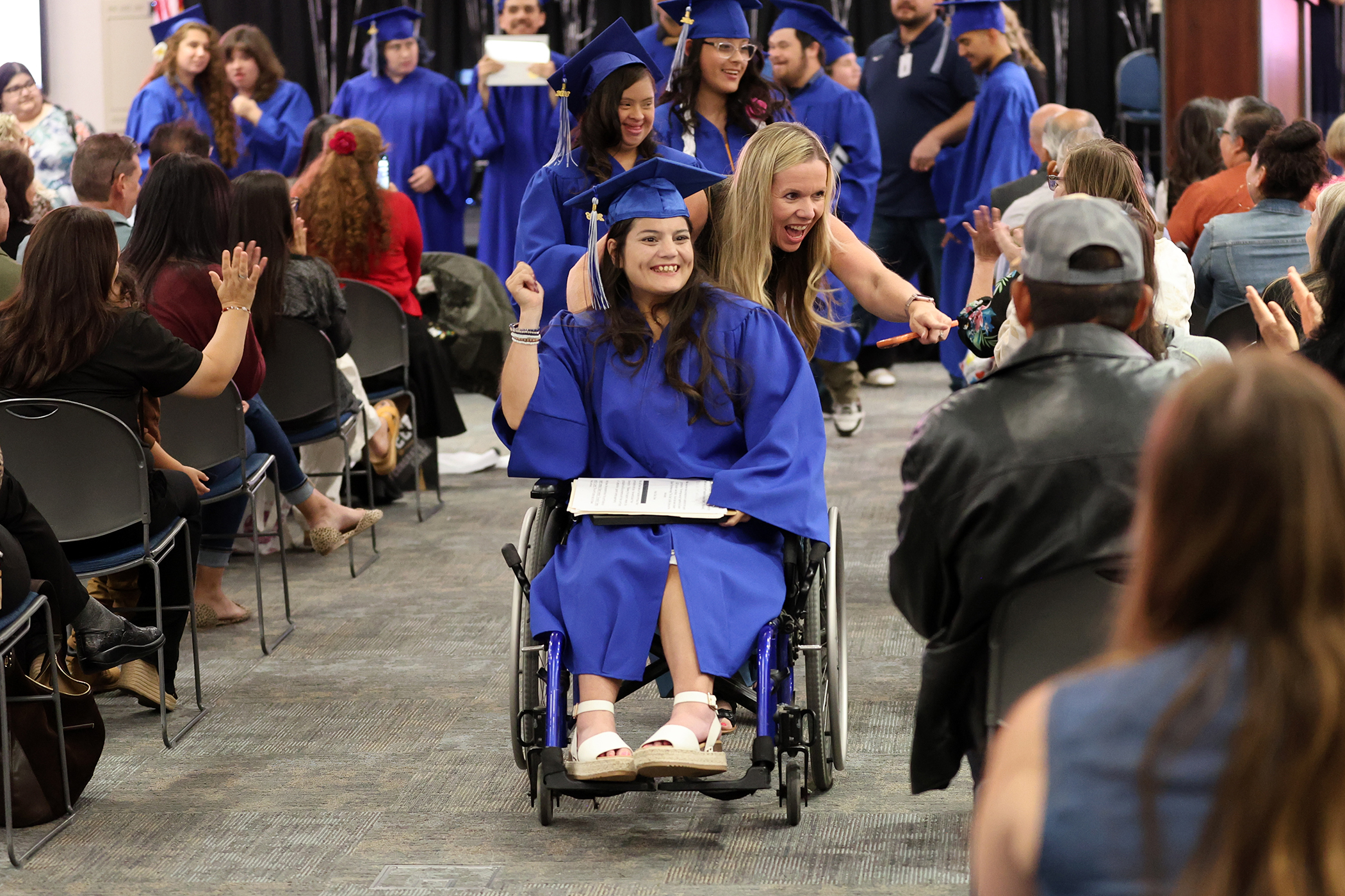 Student and teacher at 2026 Visalia AcCEL graduation