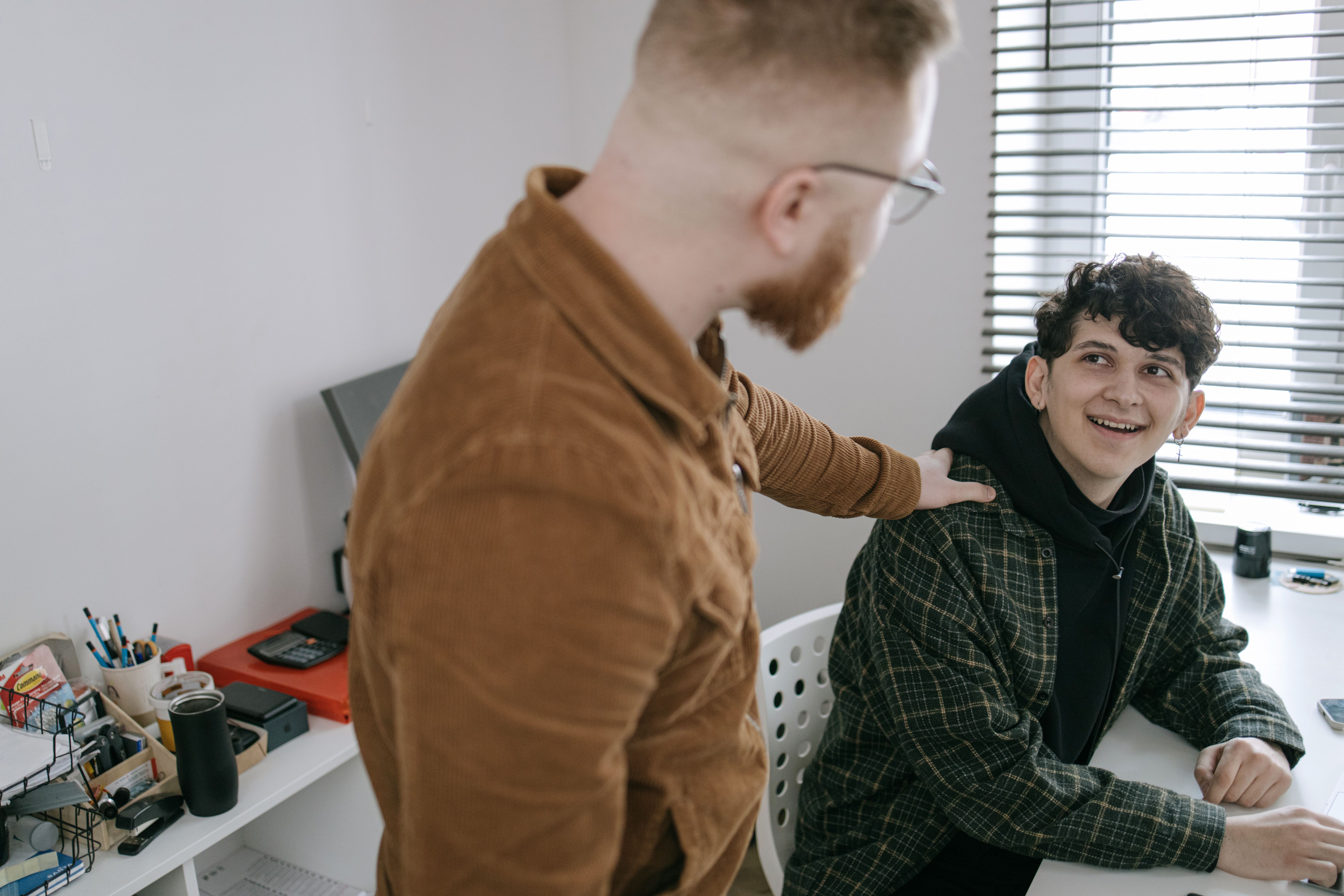 pexels-ivan-s-7213191 stock image of adult and teen