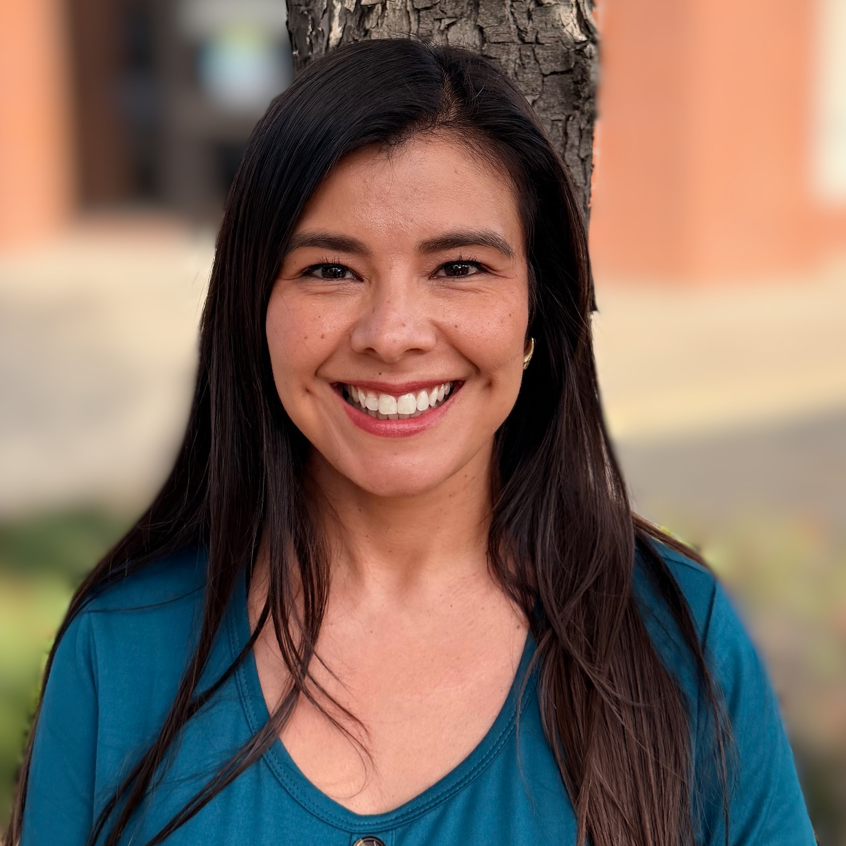JAIME Dream center female staff wearing a blue dress